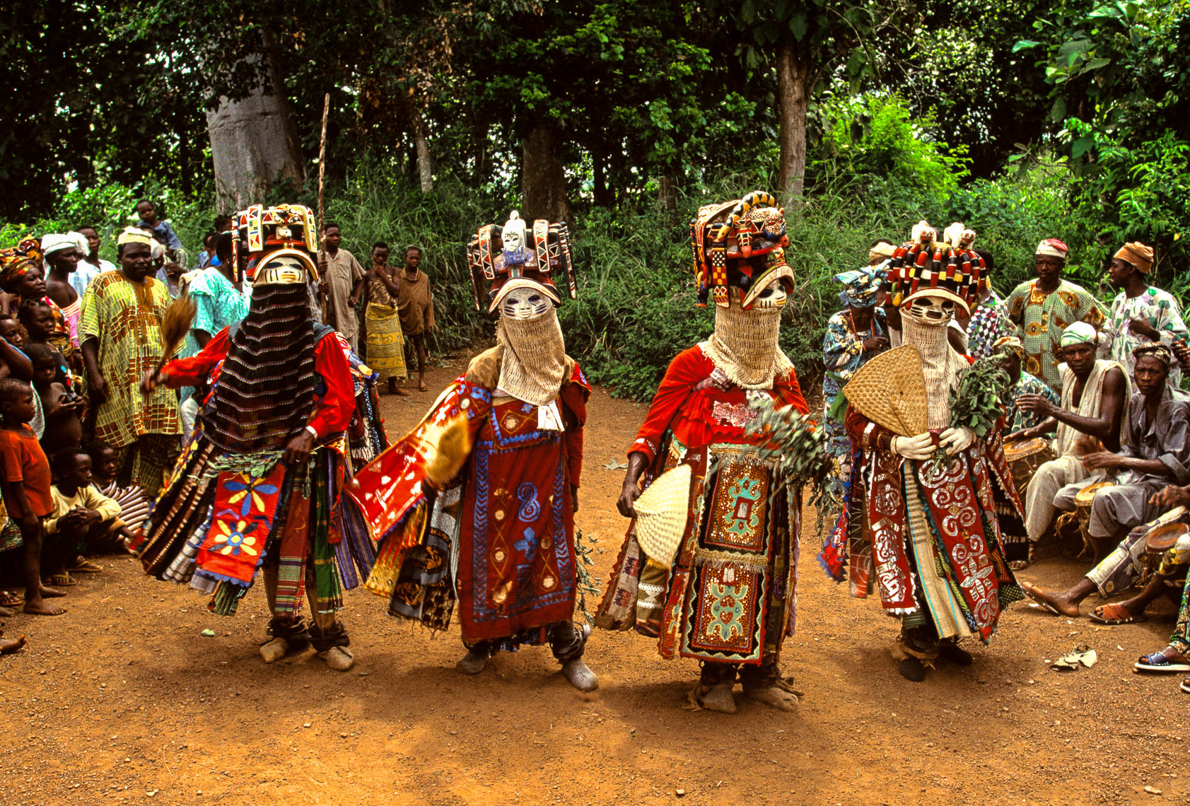 Oro Efe Masks Emerging from the Sacred Forest