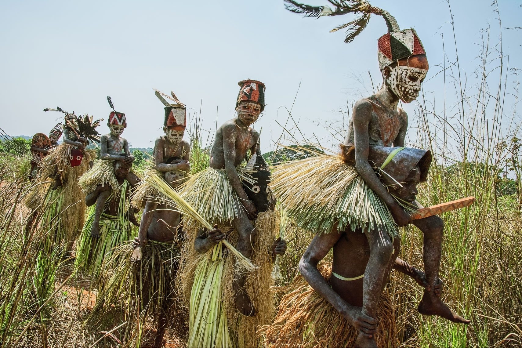 Salampasu Initiates Carried out of the Sacred Forest by Masked Guardians, D. R. Congo
