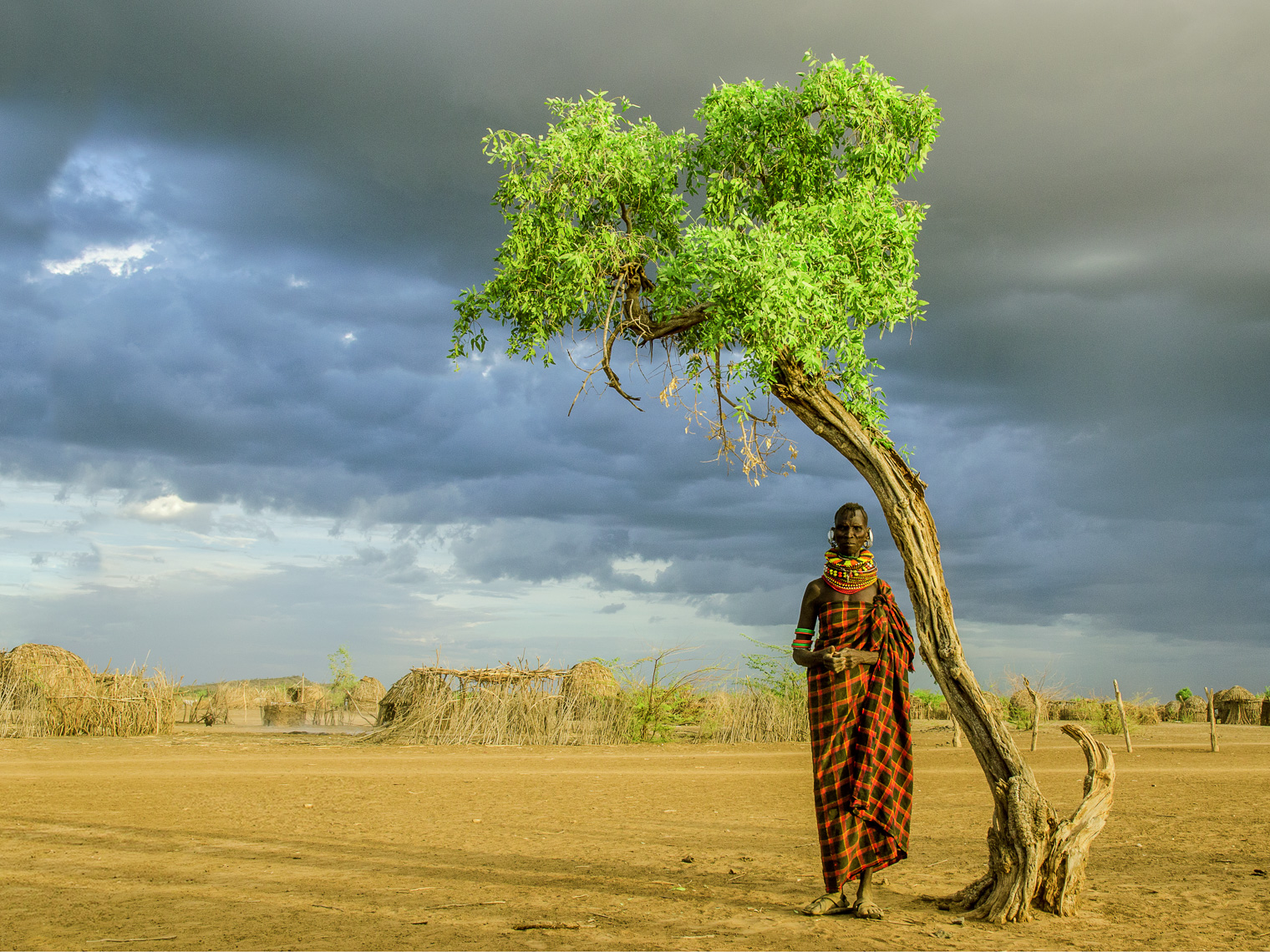 Turkana Woman by Tree, Kenya