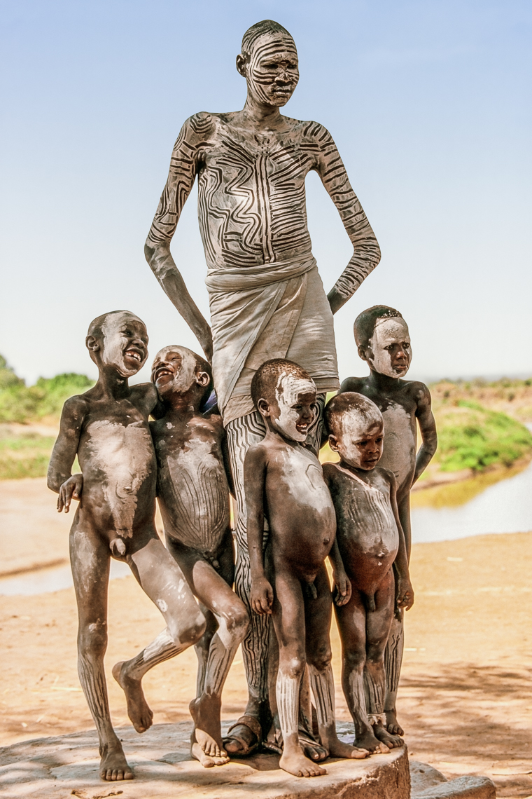 Nyangatom Man with Children, Omo Valley, Ethiopia